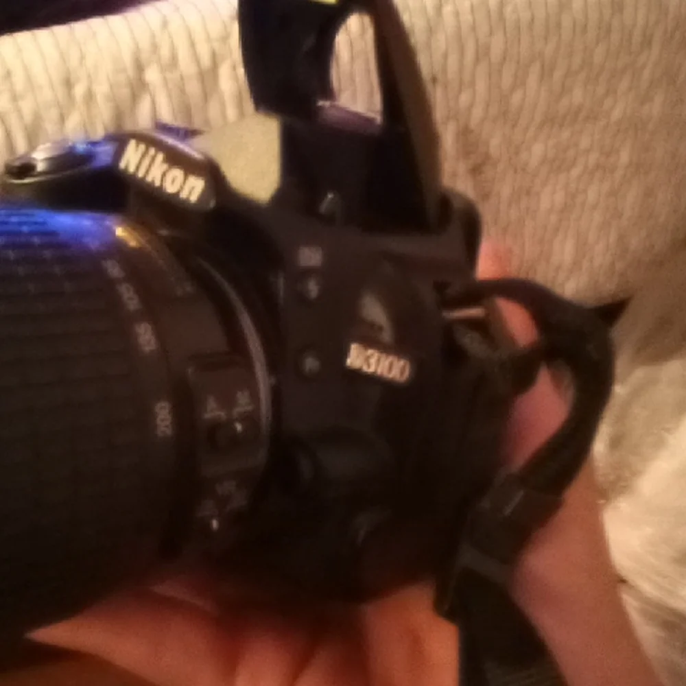 Nikon Black DSLR with Zoom Lens